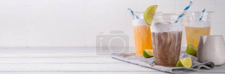 Photo for Dirty soda, soda and cream alcohol free mocktail. Iced sweet soda drink with non-dairy creamer, trendy cold summer cocktail, copy space - Royalty Free Image