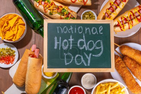 National Hot Dogs day background, hotdog summer party festival foods, Various type of traditional hot dogs - french, corn dog, classic. mexican loaded hotdog, with snack, beer bottles and sauces