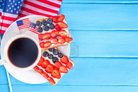 USA patriotic breakfast background, brunch menu flat lay. Simple Independent or American Flag Day idea with sweet toasts sandwiches berry flag decor, Healthy holiday July 4 breakfast