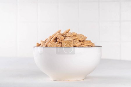 Cinnamon toast crunch mix in portioned bowl with milk.  Sweet Trendy Crunchy Cinnamon Breakfast Cereal 