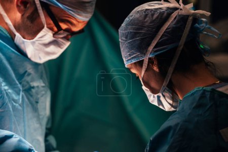 Photo for Team of Surgeons Operating in the Hospital. Healthcare concept - Royalty Free Image