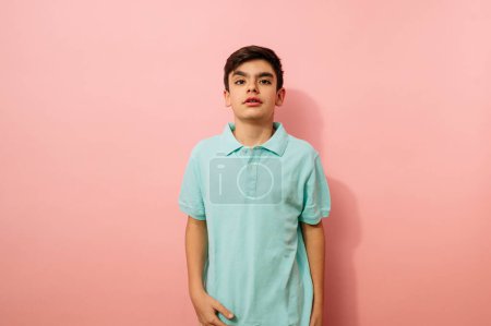 Photo for Young guy looking at camera in studio. - Royalty Free Image