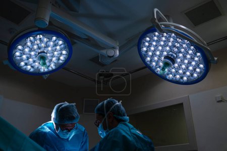 Photo for Team of Surgeons Operating in the Hospital. Healthcare concept - Royalty Free Image
