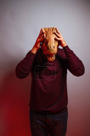 Photo for Man with lizard head in the studio. - Royalty Free Image