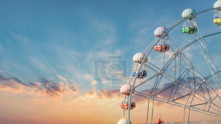 Photo for Istanbul, Turkey - 10 September 2018: Colorful ferris wheel and blue sky in Viasea Tema Park, Tuzla. Found in amusement parks worldwide, the ferris wheel is a symbol of fun and leisure - Royalty Free Image