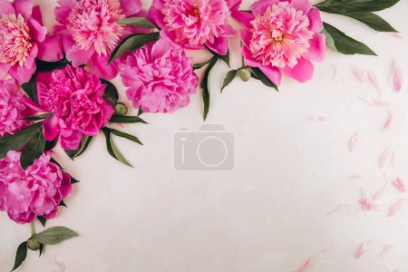Photo for Flowers composition. Border made of pink peony flowers on pastel background. Flat lay. top view with copy space - Royalty Free Image