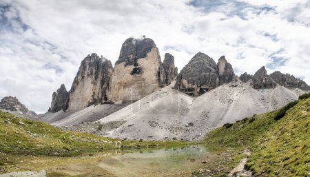 Photo for Famous Tre Cime di Lavaredo at summer time. Landscape of Alps Mountains. Dolomites, Alps, Italy, Europe (Drei Zinnen) - Royalty Free Image