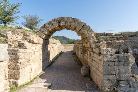 Photo for Olympia, Greece- 11 November, 2022: view of the stone stadium gate leading to the ancient stadium in Olympia - Royalty Free Image