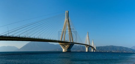 Photo for A panorama landscape view of the landmark Rio-Antirio Bridge across the Gulf of Corinth - Royalty Free Image