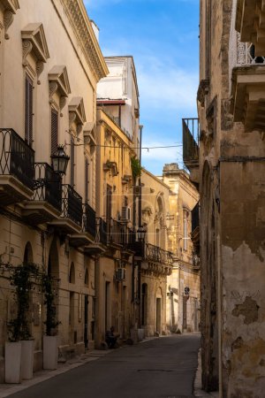 Photo for Lecce, Italy - 30 November, 2023: typical city street in the Old Town center of Lecce in Apulia - Royalty Free Image