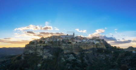 Photo for Santa Severina, Italy - 6 December, 2023: drone view of the hilltop village of Santa Severina in Calabria at sunrise - Royalty Free Image