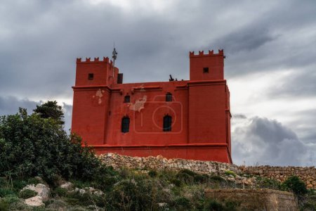 Photo for Mellieha, Malta - 21 December, 2023: view of the landmark fortress and historic Saint Agatha's Tower in Malta under an overcast sky - Royalty Free Image