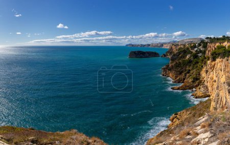 Photo for A landscape view of the rugged cliffs and shoreline at Cabo de la Nao in Javea Bay - Royalty Free Image