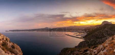 panorama landscape view of Javea Bay and port in Alicante Province at sunset