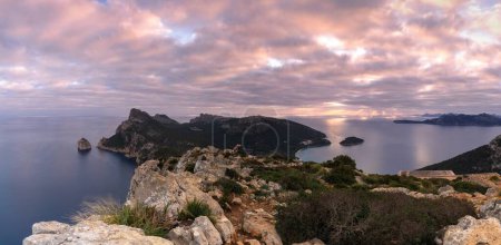 Panorama of the Albercutx Watchtower scenic viewpoint and a view of Cap de Formentor in northwestern Mallorca at sunrise