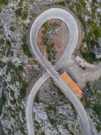 An aerial view of the Nus de Sa Corbata hairpin turn in the Serra Tramuntan of Mallorca near Coll de Reis mountain pass