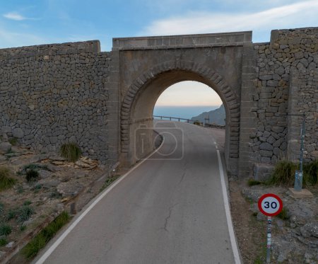 the underpass of the famous Nus de Sa Corbata hairpin turn on the Serra de Tramuntana highway in the mountains of northern Mallorca