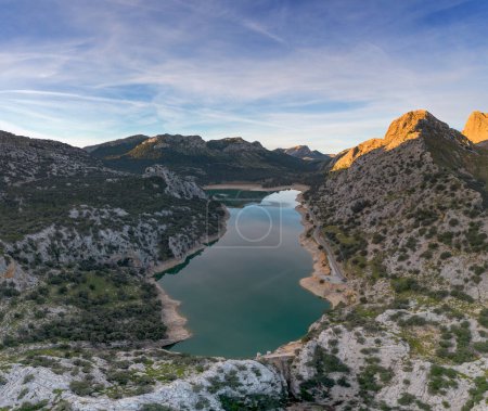 An aerial view of the picturesque Gorg Blau mountain lake and reservoir in the Serra de Tramuntana mountains of northern Mallorca