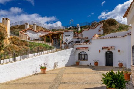 Photo for Guadix, Spain - 24 February, 2024: view of the troglodyte houses in the Barrio de Santiago of Guadix - Royalty Free Image