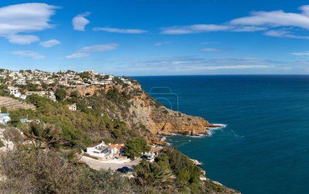 A view of Costa Nova village and the Cabo de la Nao cliffs and seaside in Alicante Province
