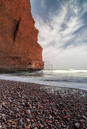 A vertical view of the rocky beach at Legzira on the Atlantic Coast of Morocco