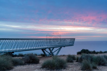 A view of the Santa Pola Viewpoint Walkway in Alicante Province at sunrise
