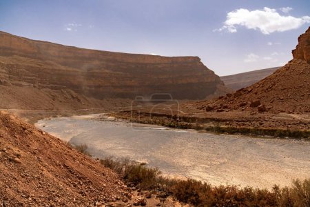 A landscape view of the semi-desert of the Ziz Valley and Ziz Valley Gorge and its dry riverbed
