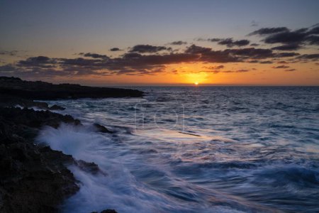 Peaceful sunrise seascape at Cap de ses Salines on Mallorca's southernmost point