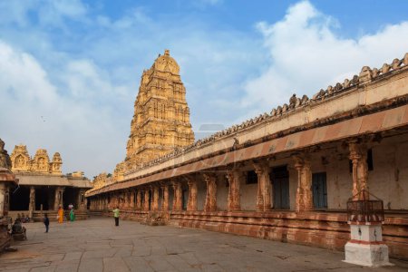 Photo for Virupaksha Temple built in the 14th century with devitees at Hampi Karnataka - Royalty Free Image