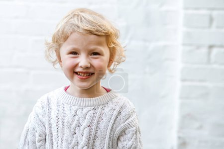 Photo for World lights up with the childs charming and endearing smile. - Royalty Free Image