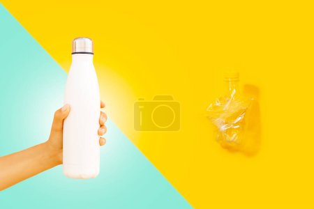 Photo for Steel thermo water bottle with mockup in female hand and crumpled plastic bottle on background of yellow and cyan of colors. - Royalty Free Image
