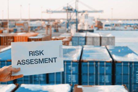 Banner Poster Paper With The Phrase Risk Assesment With A Logistics Terminal In The Background