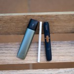 Tarragona, Spain - September 16, 2022: Electronic cigarettes IQOS close-up. Different options for smoking and cigarette. Choice of devices for the use of nicotine.