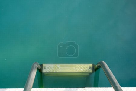 Photo for Swimming pool with dirty green water close-up. - Royalty Free Image