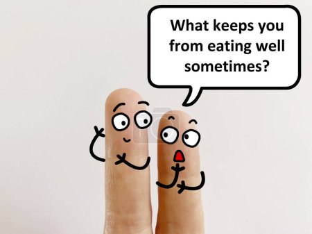 Photo for Two fingers are decorated as two person. One of them is asking another what keeps him from eating well sometimes. - Royalty Free Image