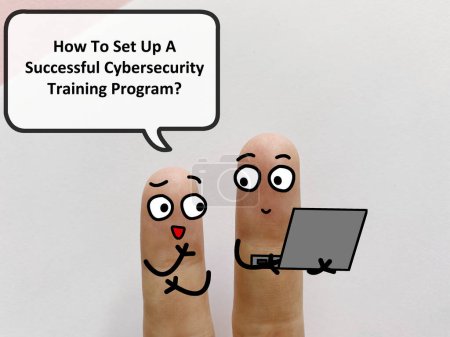 Photo for Two fingers are decorated as twoperson. They are discussing about cybersecurity. One of them is asking another how to set up a successful cybersecurity training program. - Royalty Free Image