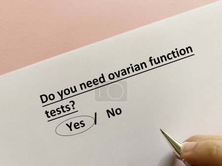 Foto de One person is answering question about infertility. She needs ovarian function tests. - Imagen libre de derechos