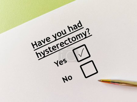 Téléchargez les photos : One person is answering question about surgical procedure. He had hysterectomy. - en image libre de droit
