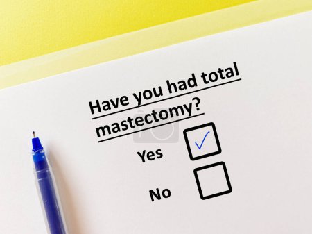 Téléchargez les photos : One person is answering question about surgical procedure. He had total mastectomy. - en image libre de droit