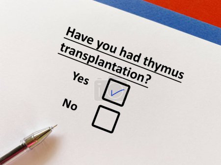 Téléchargez les photos : One person is answering question about surgical procedure. He had thymus transplantation. - en image libre de droit