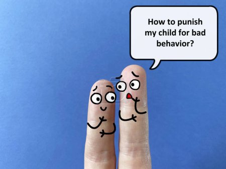 Téléchargez les photos : Two fingers are decorated as two person. One of them is asking another how to punish child for bad behaviour. - en image libre de droit