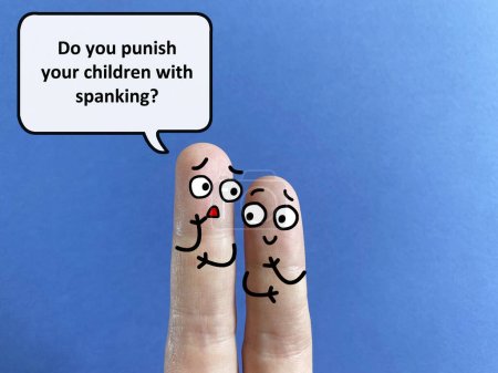 Téléchargez les photos : Two fingers are decorated as two person. One of them is asking another if she punishes his children with spanking. - en image libre de droit