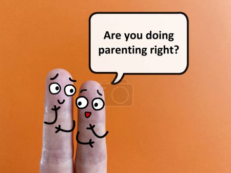 Téléchargez les photos : Two fingers are decorated as two person. One of them is asking another if he is doing parenting right. - en image libre de droit