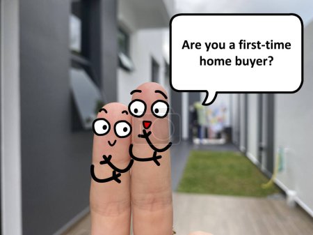 Téléchargez les photos : Two fingers are decorated as two person standing outside a new house. One of them is asking another if he is a first time home buyer. - en image libre de droit
