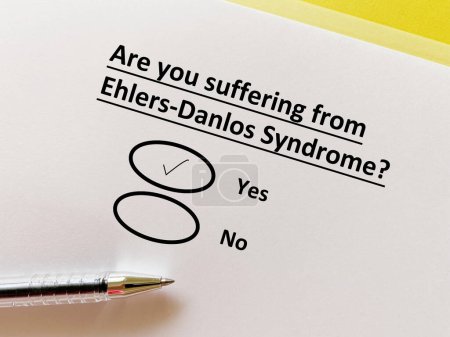 Photo for A person is answering question about illness. She is suffering from Ehlers Danlos syndrome. - Royalty Free Image