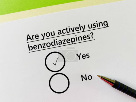 Photo for A person is answering question about substance use. He is actively using benzodiazepine. - Royalty Free Image