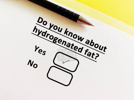 Photo for A person is answering question about food manufacturing. He knows about hydrogenated fat. - Royalty Free Image