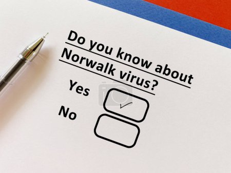 Photo for A person is answering question about food manufacturing. He knows about Norwalk virus. - Royalty Free Image