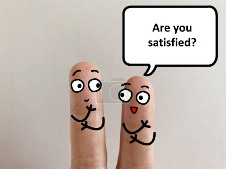 Photo for Two fingers are decorated as two person. One of them is asking another if he is satisfied. - Royalty Free Image