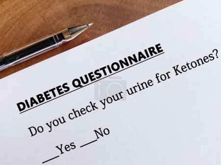 Foto de A person is answering question about diabetes. He checks his urine for ketones. - Imagen libre de derechos